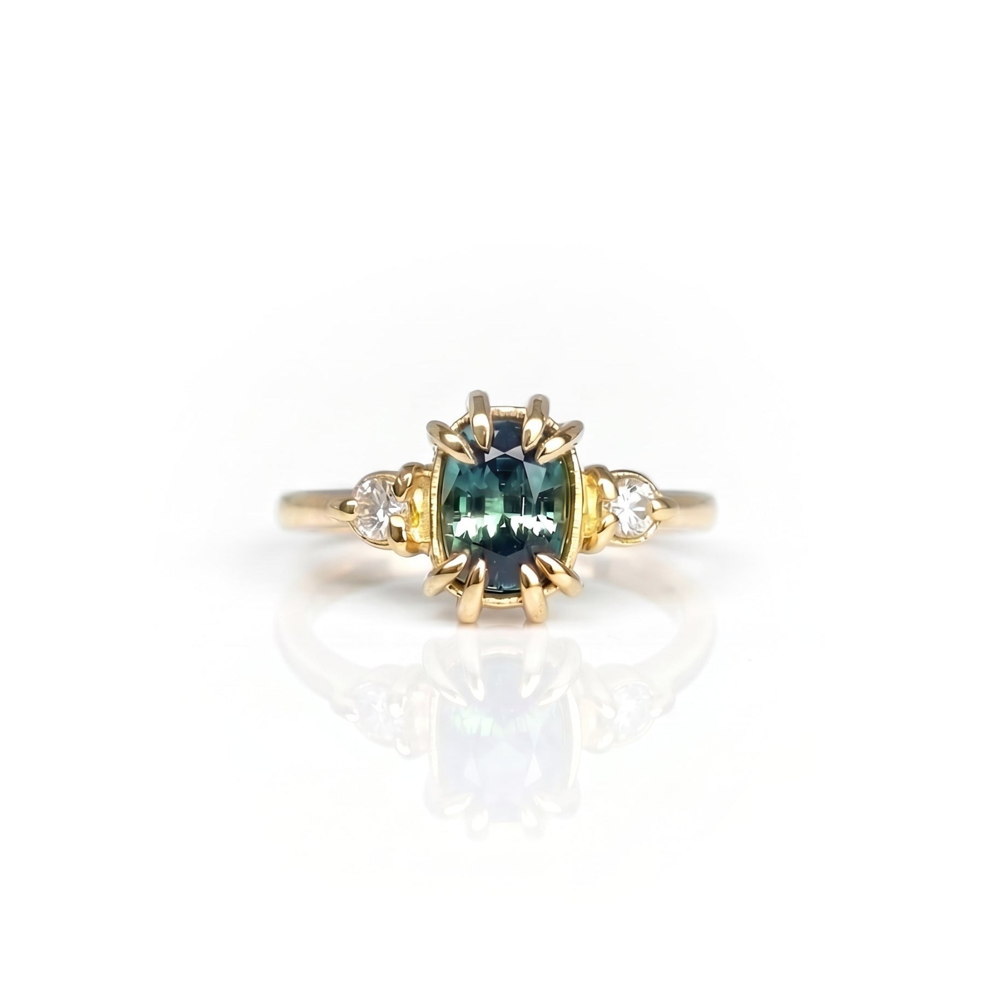 Handmade 18ct yellow gold engagement ring featuring an Australian Sapphire and Diamonds, set in large decorative claws / prongs