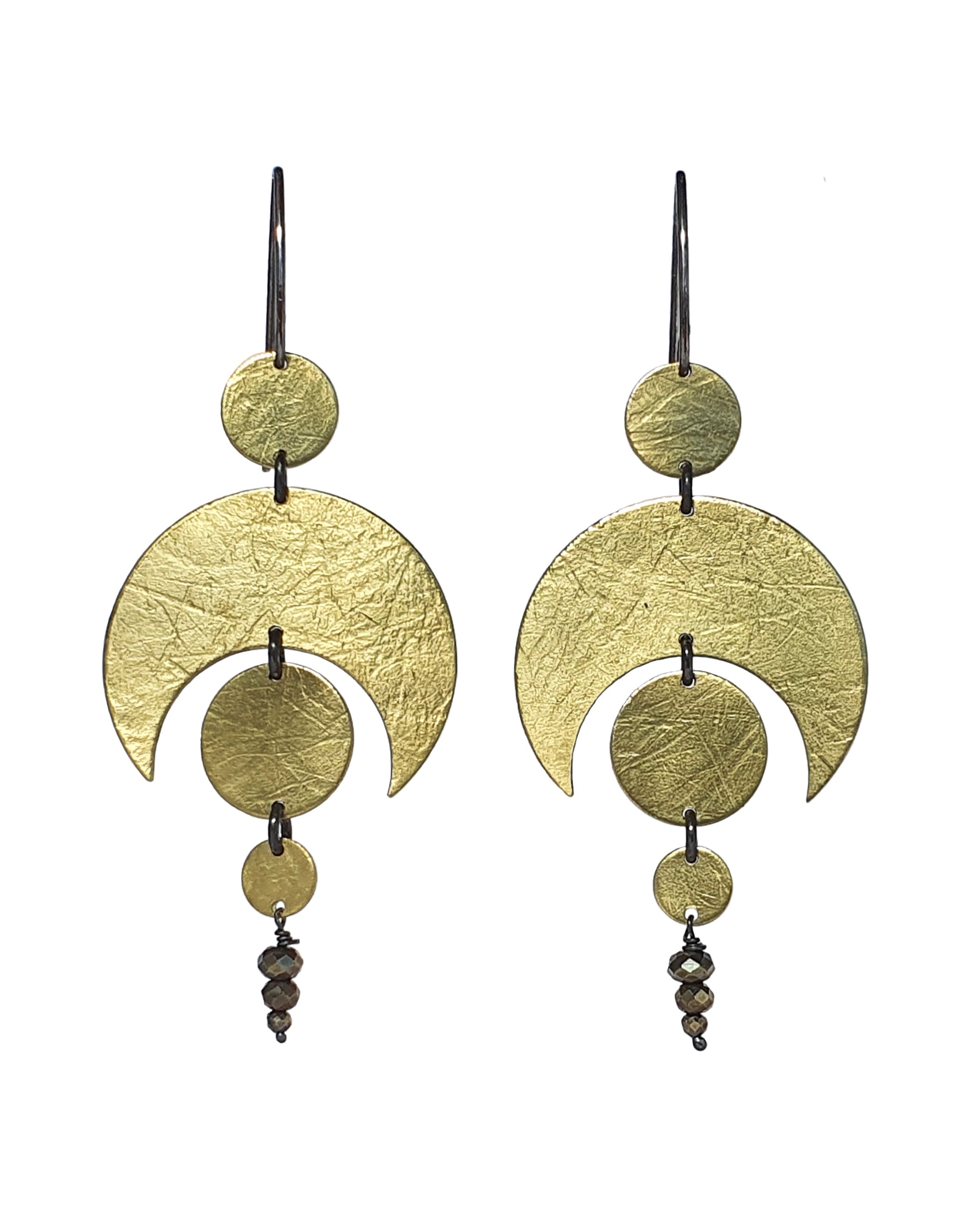 Pair of golden Brass Celestial Earrings with circular and crescent designs on a white background.