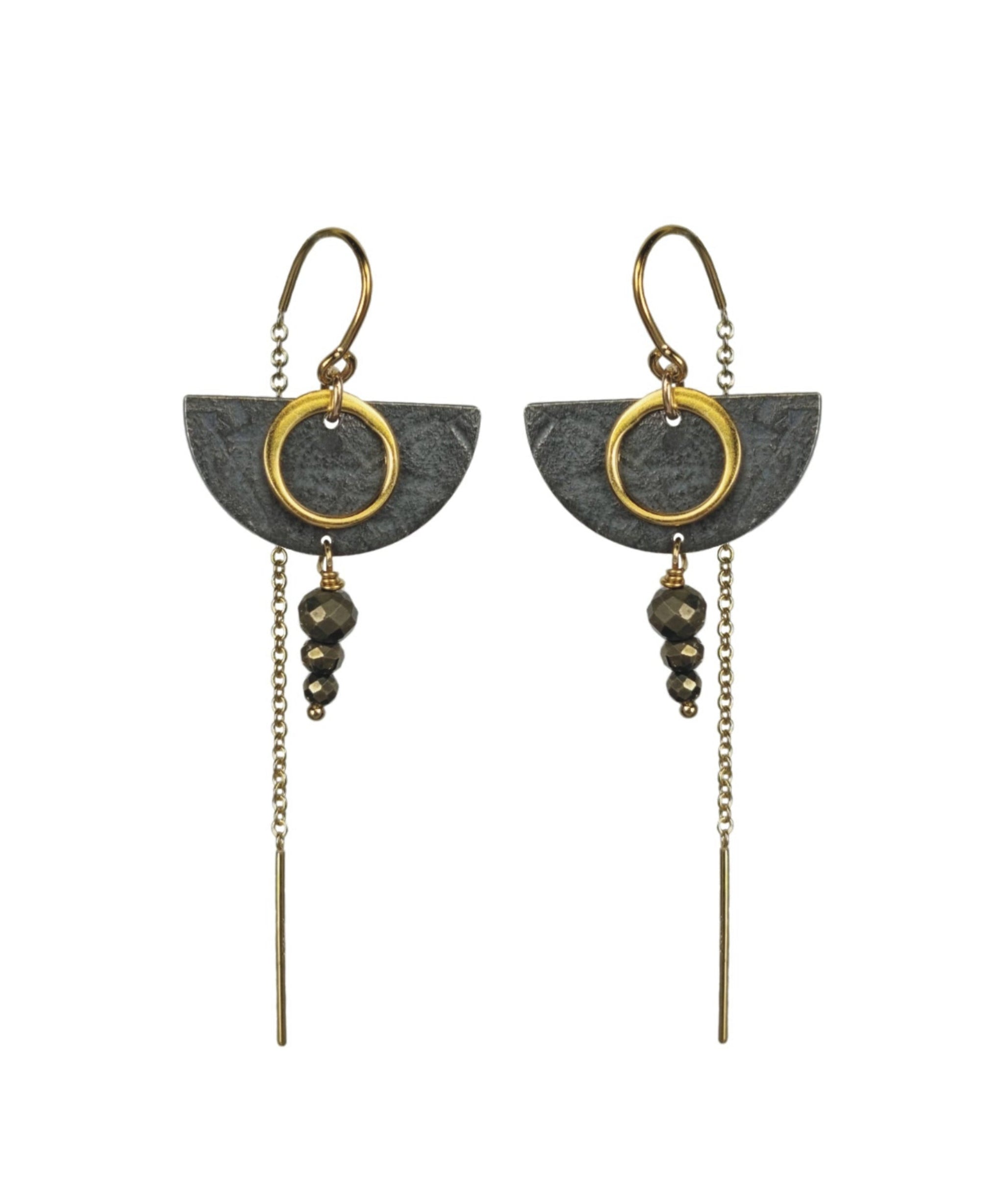 Pair of earrings with geometric design on a white background