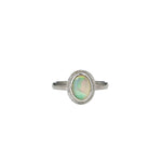 The Silver Aura Stained Glass Opal Silver Ring on a white background, featuring a unique Crystal Opal with vibrant colours, reminiscent of a stained-glass window, set in a Sterling Silver band