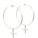 The Venus Hoop Sterling Silver Earrings, handmade by Emily Eliza Arlotte in Hobart, Tasmania sit on a white background. The oversized hoops are in the shape of the feminist femme symbol.