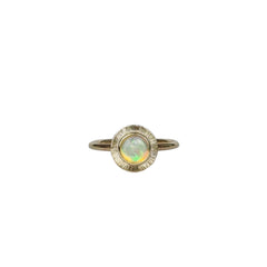 A gold ring featuring a multi-coloured Australian Crystal Opal set in a radiant gold engraved setting
