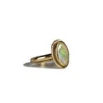 Large Australian Opal set in a gold ring.