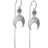 Lunar crescent moon thread earrings in bright sterling silver featuring a textured surface, on a white background.