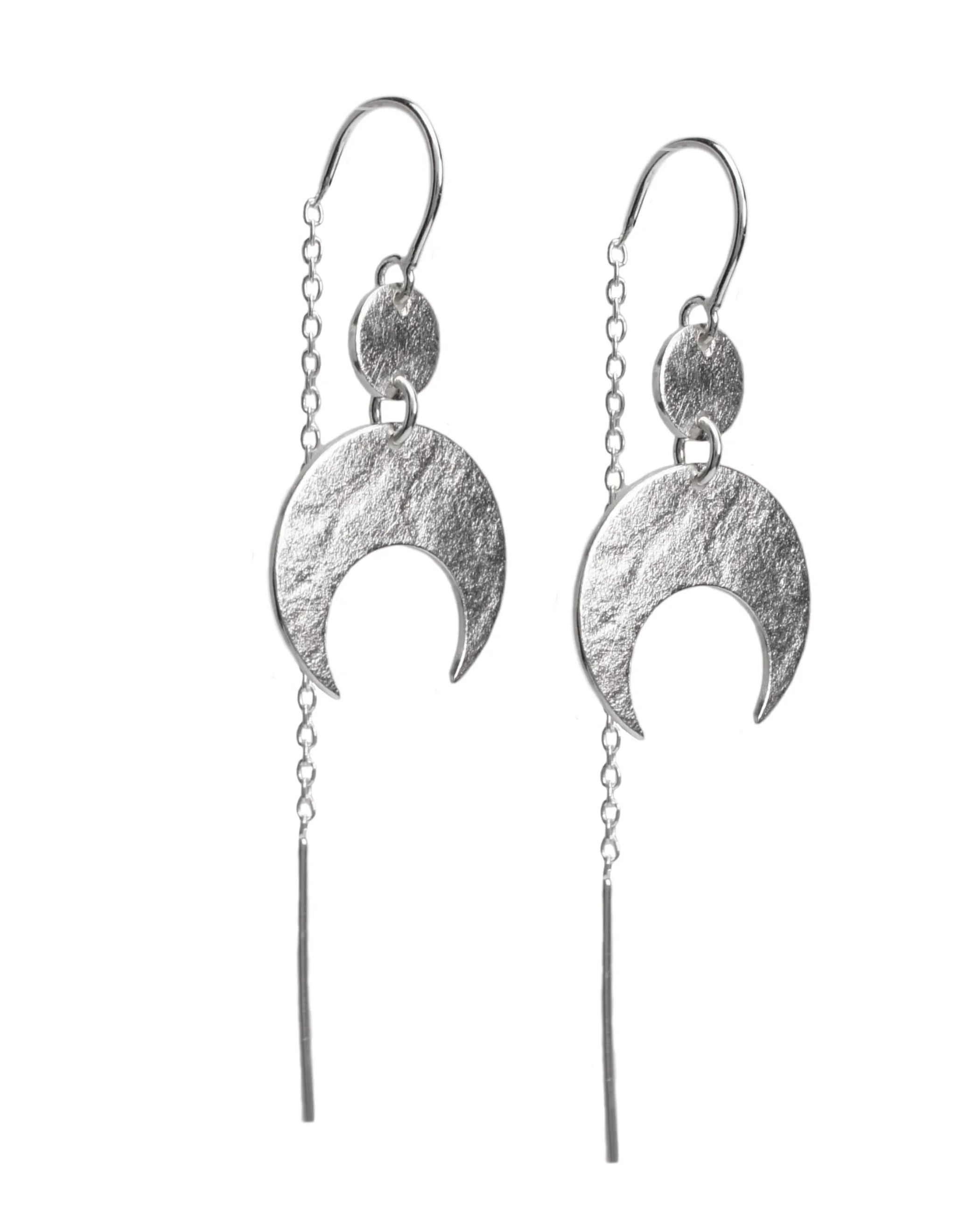 Lunar crescent moon thread earrings in bright sterling silver featuring a textured surface, on a white background.