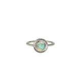A handmade sterling silver ring featuring an Australian Crystal Opal from Coober Pedy. The opal features pinks, greens, and blue swirls of colour and is set in a radiant engraved silver setting.