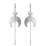 Sterling Silver Lunar Thread Earrings on a white background, featuring a textured disc and crescent moon.