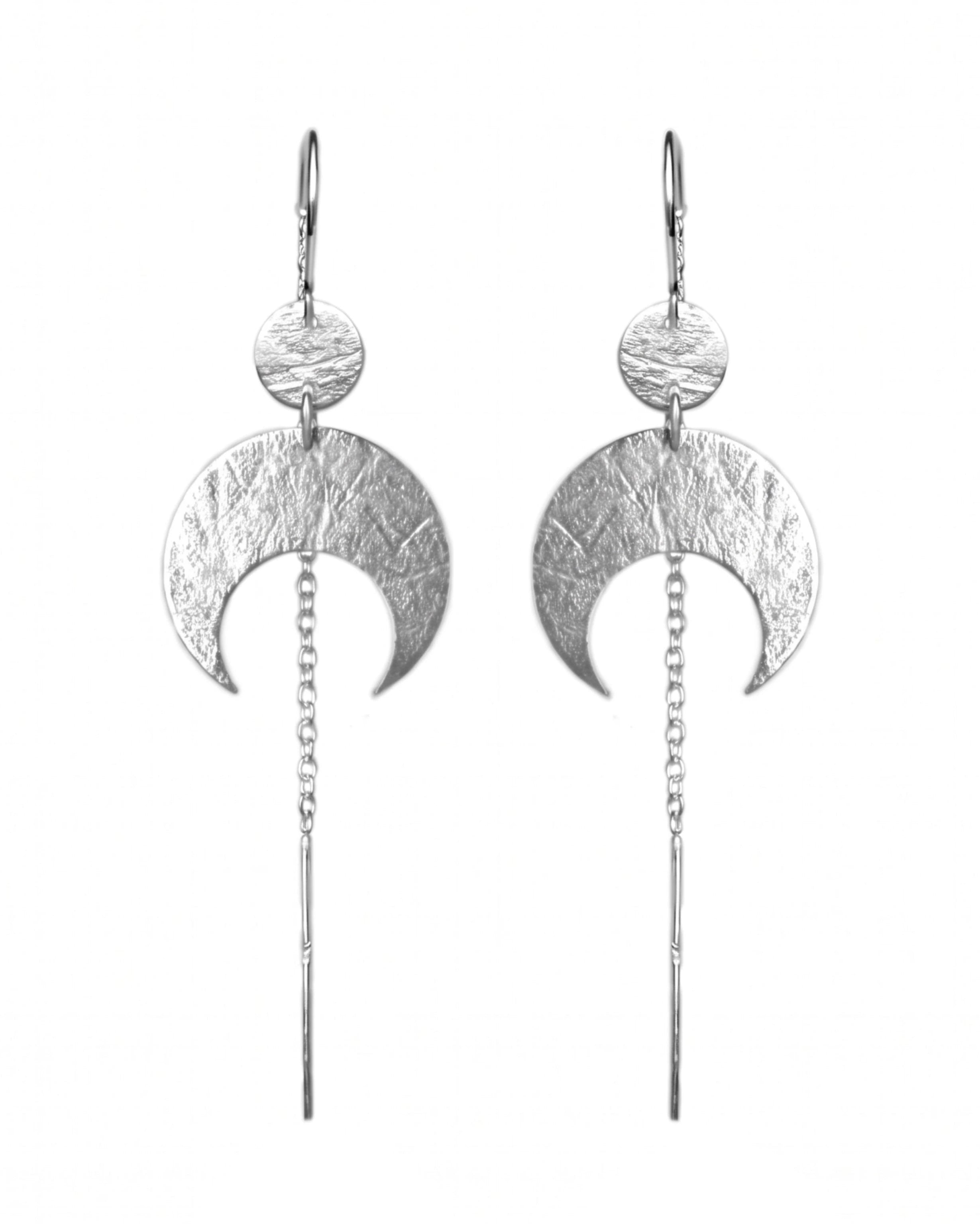 Sterling Silver Lunar Thread Earrings on a white background, featuring a textured disc and crescent moon.