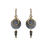 A pair of Zenith II Hook earrings, featuring a geometric design, mixed metals of gold and oxidised silver plus Pyrite gemstones. The earrings are handmade by Emily Eliza Arlotte in Hobart Tasmania from Sterling Silver, 14ct Gold-filled details and Pyrite.