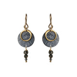 A pair of Zenith II Hook earrings, featuring a geometric design, mixed metals of gold and oxidised silver plus Pyrite gemstones. The earrings are handmade by Emily Eliza Arlotte in Hobart Tasmania from Sterling Silver, 14ct Gold-filled details and Pyrite.