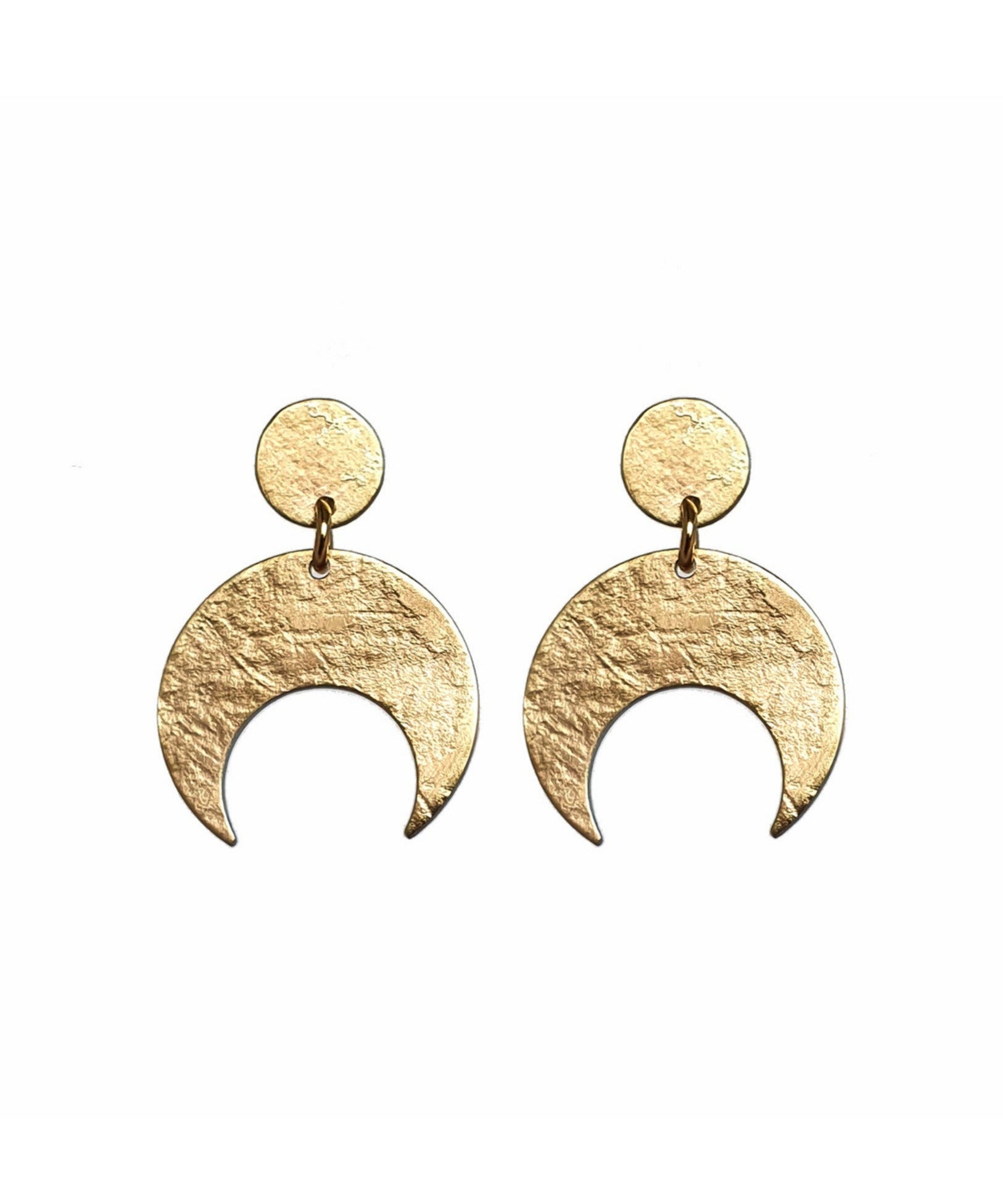 Gold crescent moon earrings on a white background