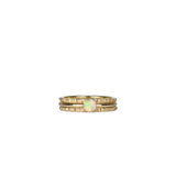 Three-piece Crystal Opal Gold Stack Ring Set displayed on a white background, highlighting the unique transparency and kaleidoscope of colours of the Australian Crystal Opal