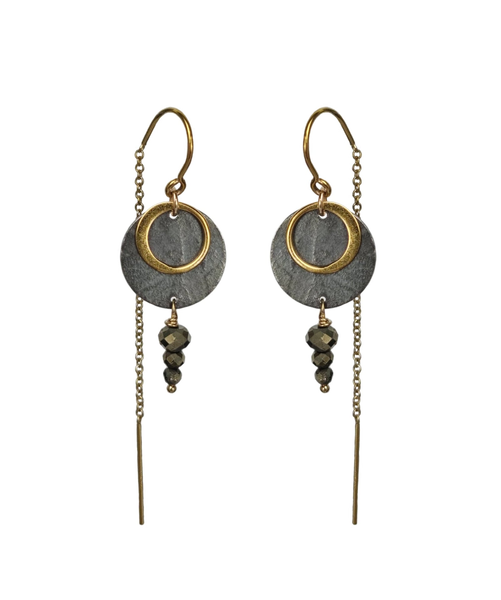 A pair of Zenith II Thread earrings, featuring a geometric design, mixed metals of gold and oxidised silver plus Pyrite gemstones. The earrings are handmade by Emily Eliza Arlotte in Hobart Tasmania from Sterling Silver, 14ct Gold-filled details and Pyrite.