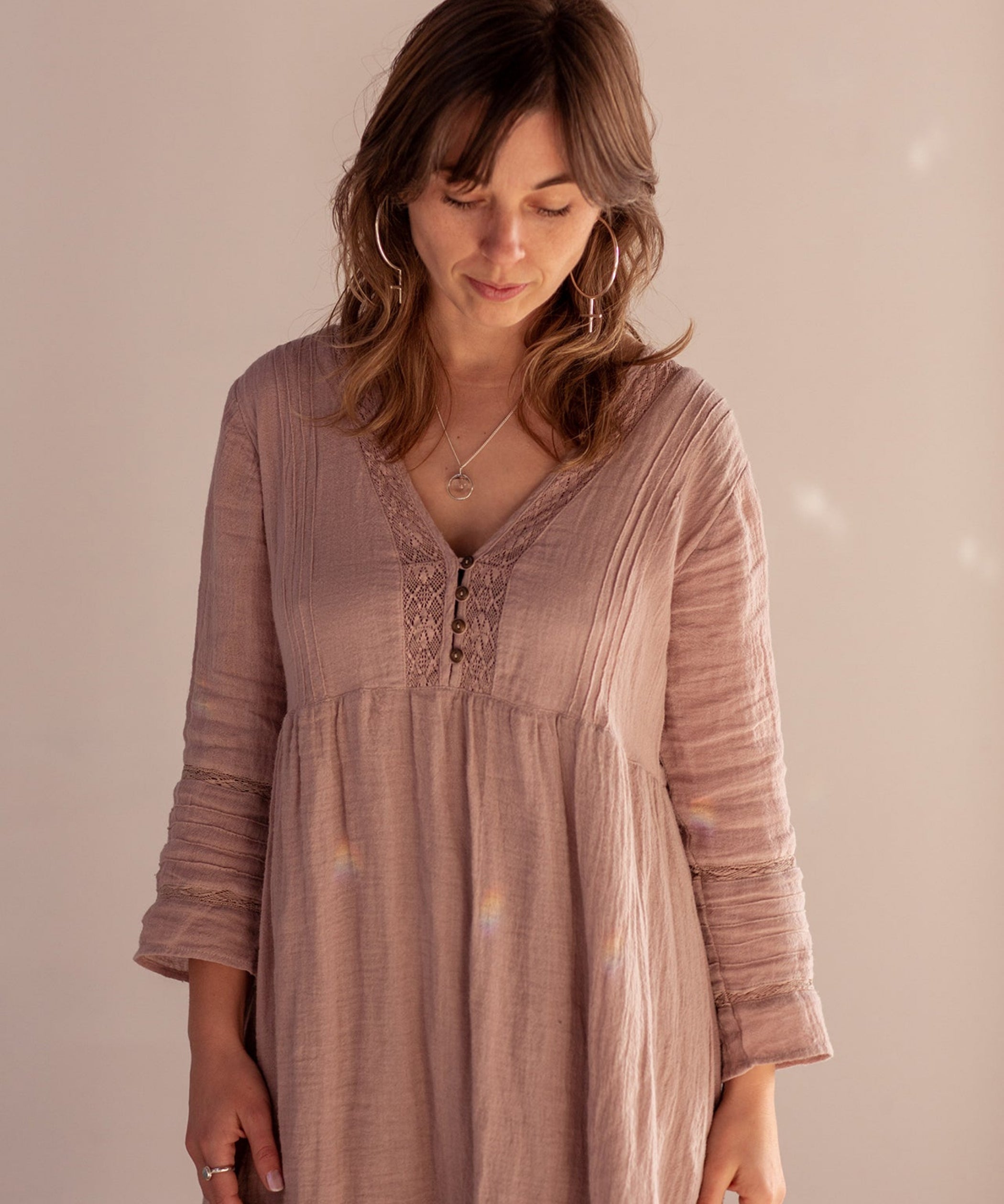 Emily Eliza Arlotte Fine Jewellery - Editorial Photoshoot by Cassie Sullivan Photography Model wearing pink with  soft pink background wearing Sterling Silver Venus Feminism Symbol Large Oversized Hoop Earrings 