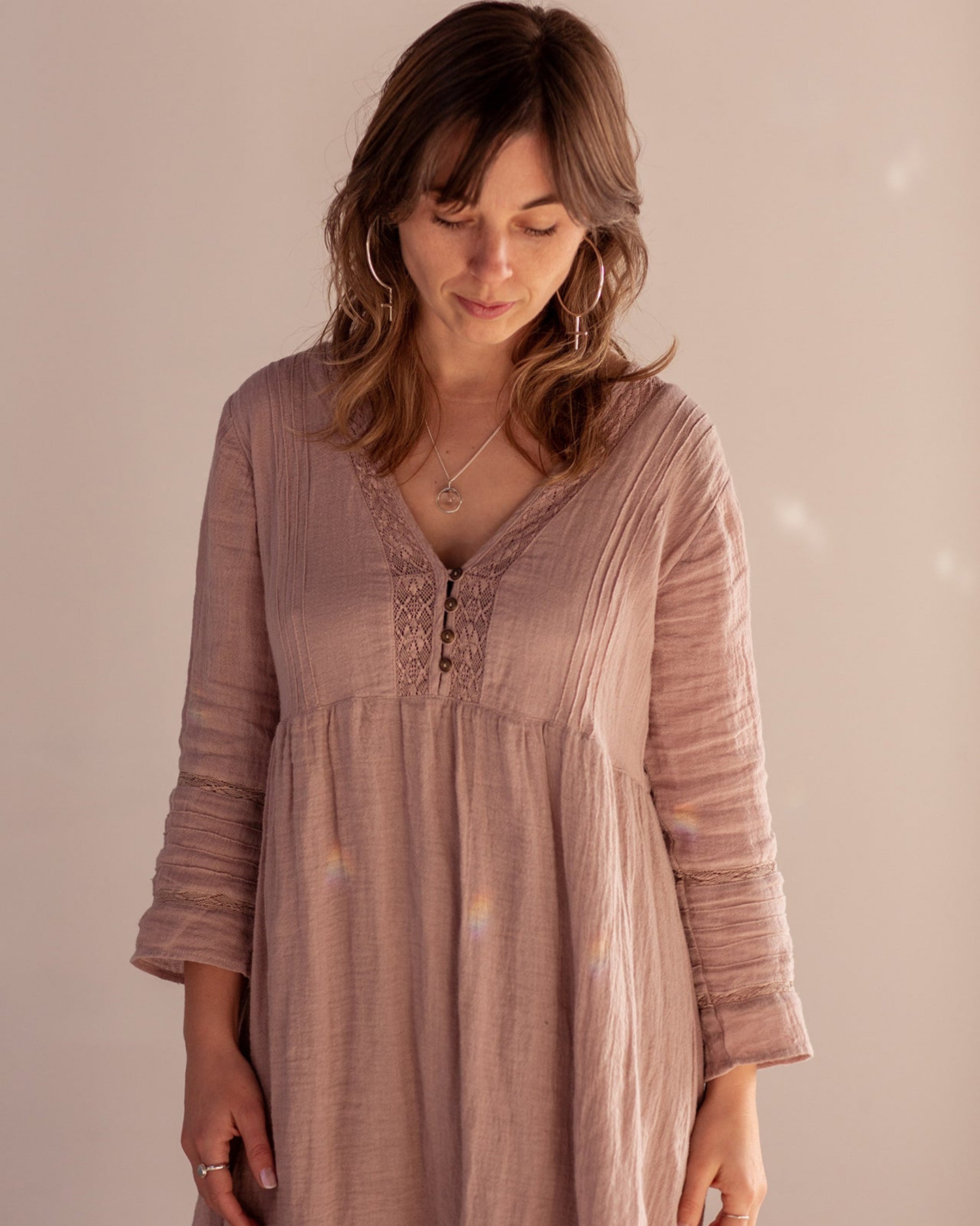 Emily Eliza Arlotte Fine Jewellery - Editorial Photoshoot by Cassie Sullivan Photography Model wearing pink with  soft pink background wearing Sterling Silver Venus Feminism Symbol Large Oversized Hoop Earrings 