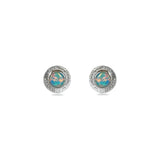 A pair of handmade opal stud earrings by Emily Eliza Arlotte, featuring mint green blue opals and an engraved textured halo, on a white background.