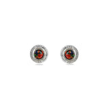 A pair of handmade opal stud earrings by Emily Eliza Arlotte, featuring red and black opals and an engraved textured halo, on a white background.