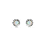 A pair of handmade opal stud earrings by Emily Eliza Arlotte, featuring white opals and an engraved textured halo, on a white background.