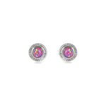 A pair of handmade opal stud earrings by Emily Eliza Arlotte, featuring violet purple opals and an engraved textured halo, on a white background.