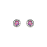 A pair of handmade opal stud earrings by Emily Eliza Arlotte, featuring violet purple opals and an engraved textured halo, on a white background.
