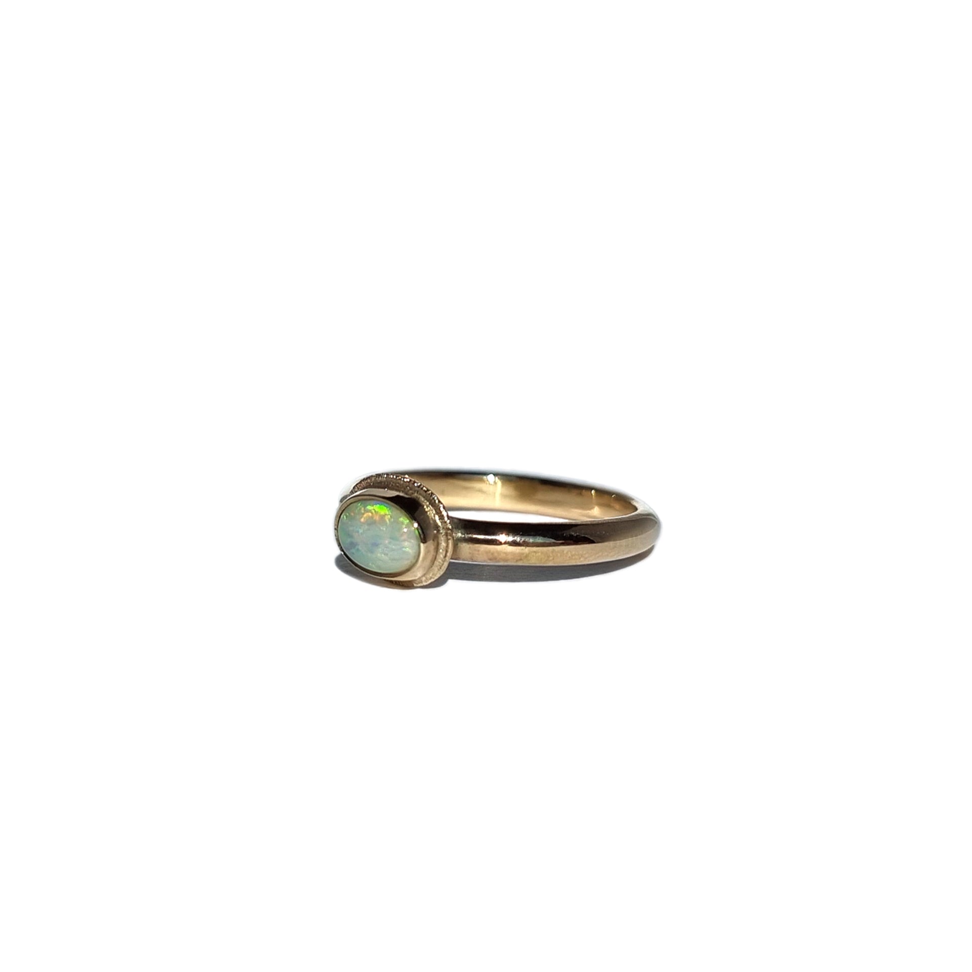 Solid Opal + Gold Halo Ring